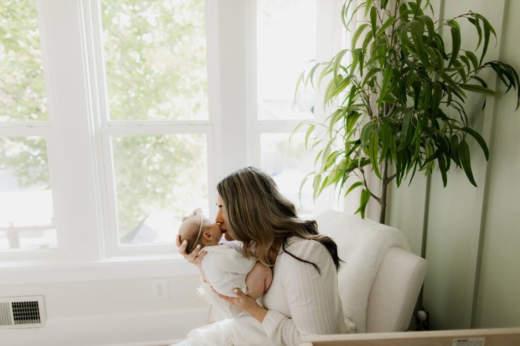 lifestyle family newborn session in beautiful baby nursery in seattle