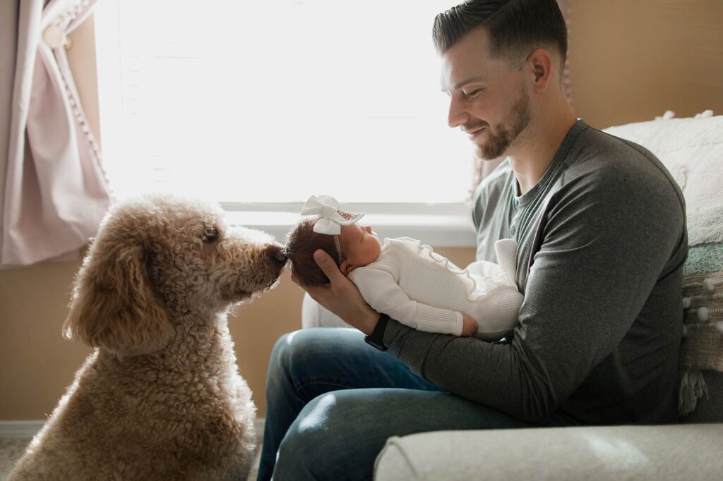 auburn family newborn in home lifestyle session with baby girl and dog