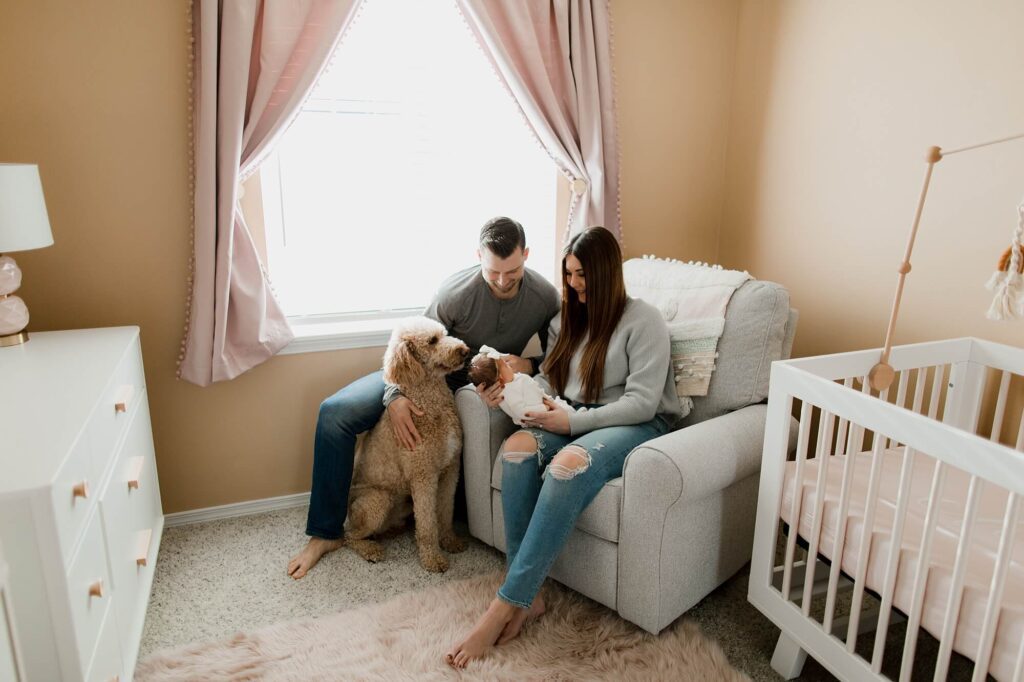 auburn family newborn in home lifestyle session with baby girl and dog