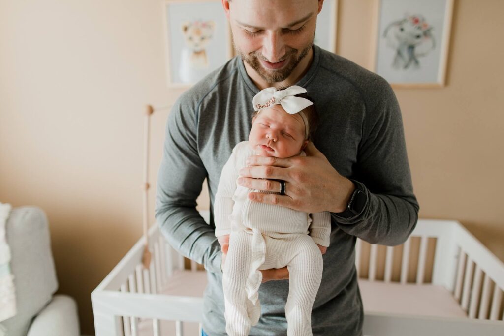 auburn family newborn in home lifestyle session with baby girl and dog