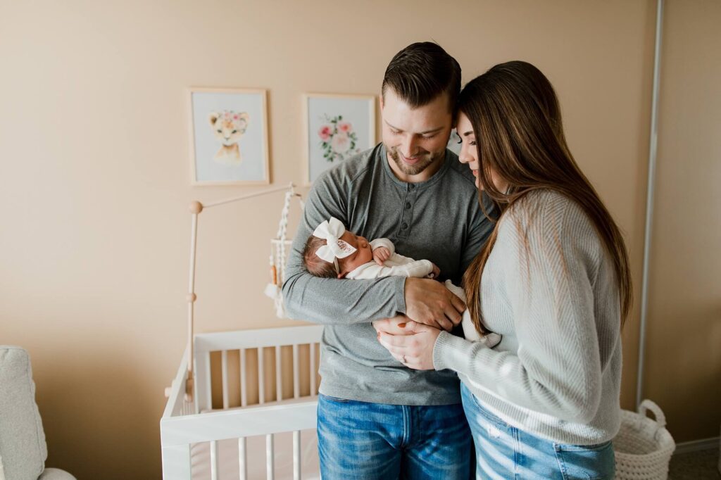 auburn family newborn in home lifestyle session with baby girl and dog