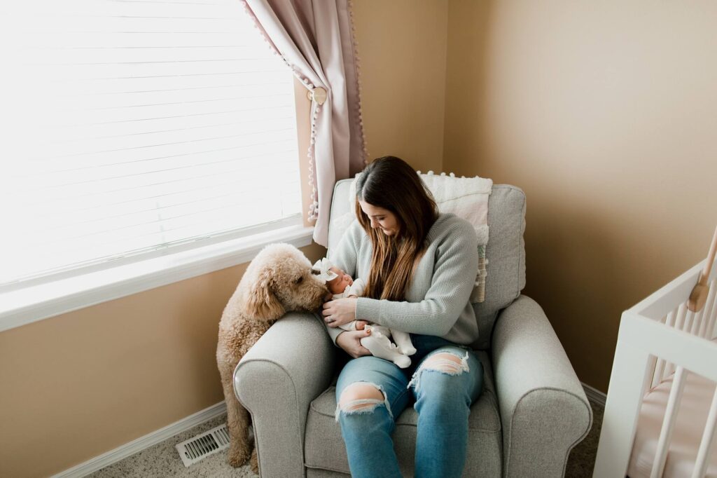 auburn family newborn in home lifestyle session with baby girl and dog