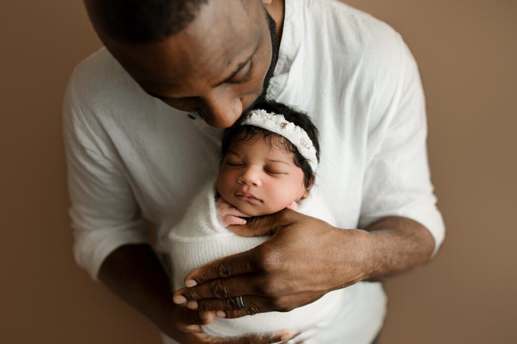 Seattle newborn photographer photos of baby girl in photography studio