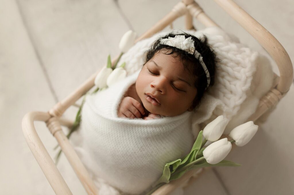 Seattle newborn photographer photos of baby girl in photography studio