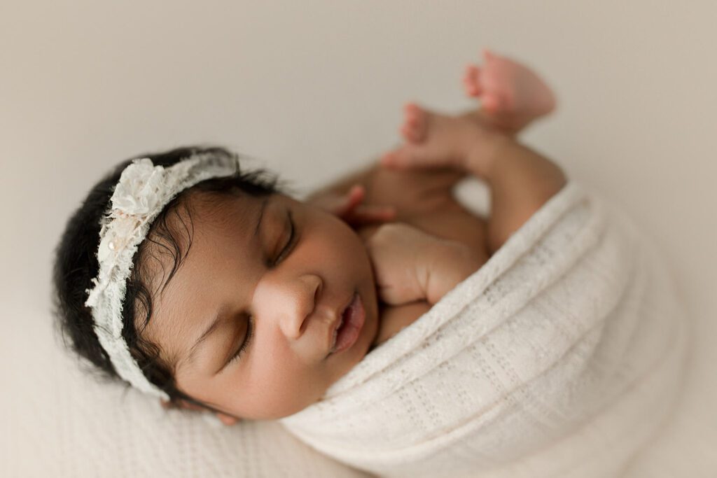 Seattle newborn photographer photos of baby girl in photography studio