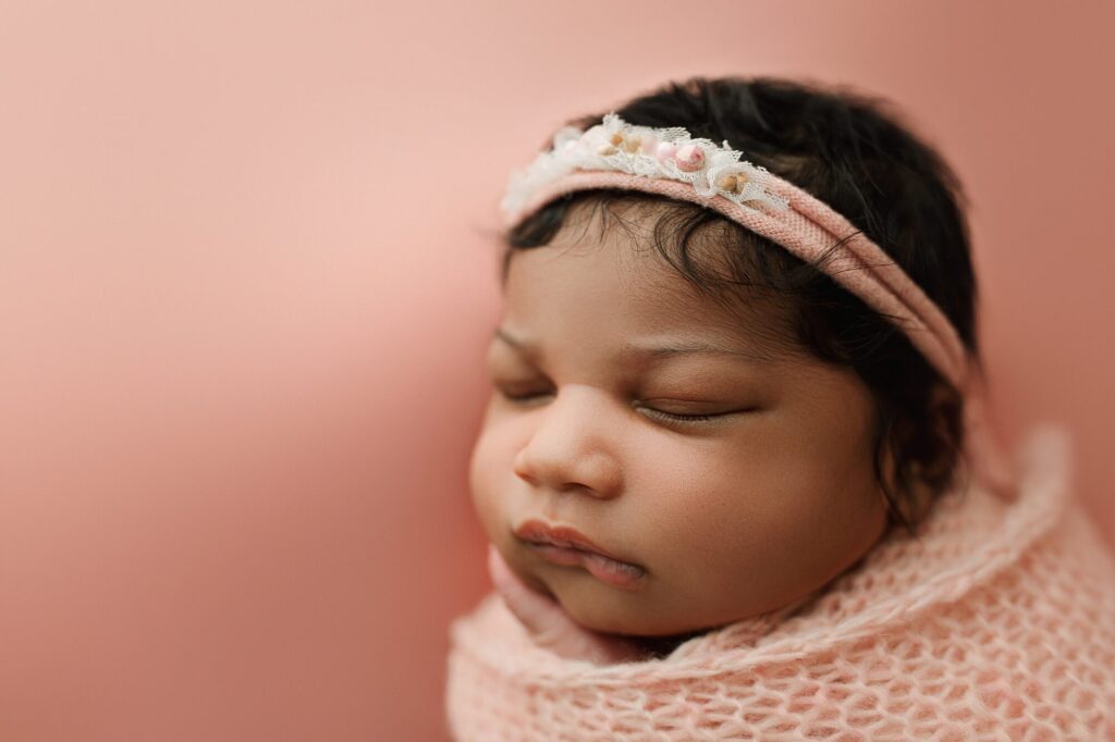 Seattle newborn photographer photos of baby girl in photography studio