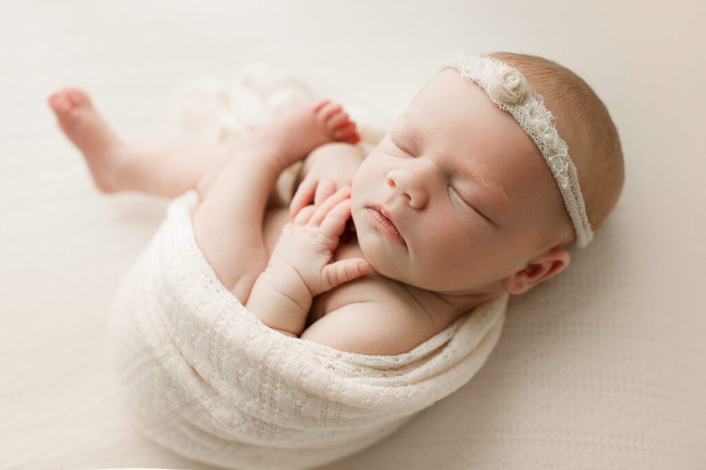 seattle newborn photographer photographed baby girl in studio
