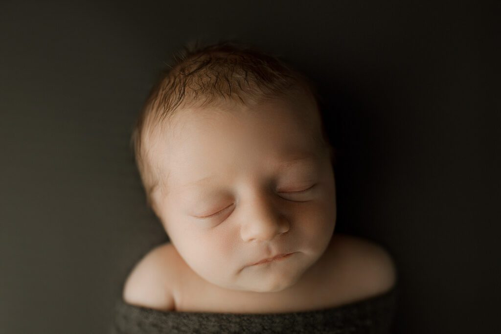 posed newborn photographer tacoma in studio