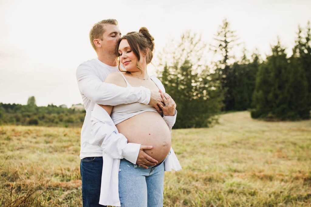 Seattle area maternity photographer capturing sunset maternity session in Kent WA