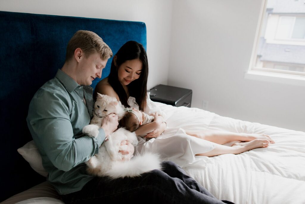 family newborn session in seattle with baby girl and cat