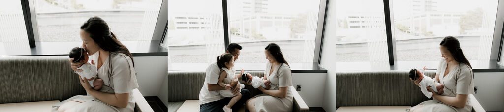 Family meeting their newborn in a hospital room during a Fresh 48 session in Seattle